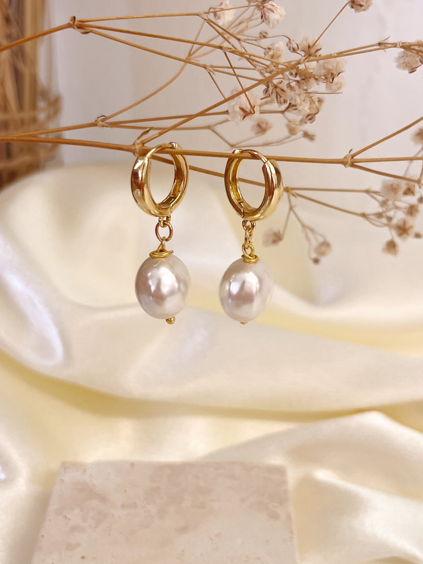 Chunky pearl huggies