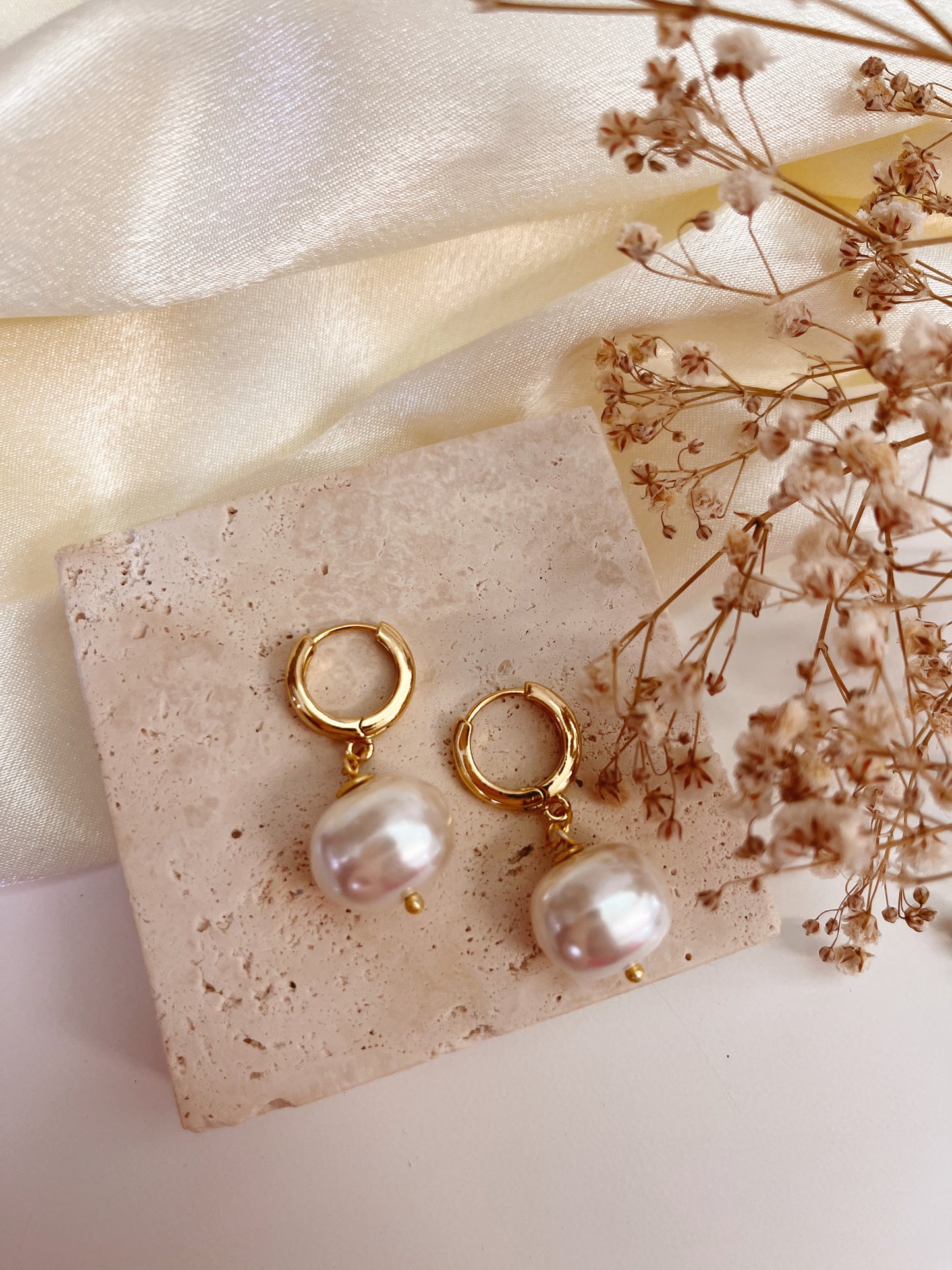 Chunky pearl huggies